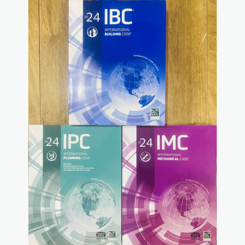 Book cover of 2024 IMC, IPC & IBC Code Book – International Building & Plumbing
